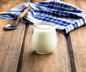 natural yoghurt on a wooden background
