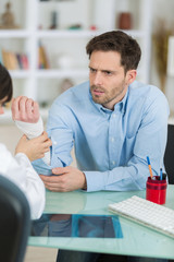 Obraz premium young patient during consultation in doctors office