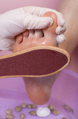 pedicure process and spa procedure macro closeup. 
