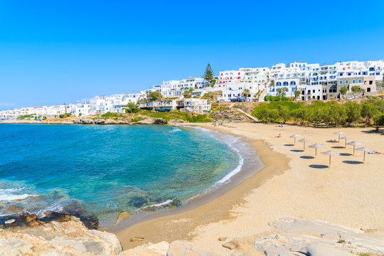 Fototapeta View of beautiful sea bay with beach in Naoussa town, Paros island, Greece