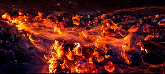 burning charcoal as background - obrazy, fototapety, plakaty