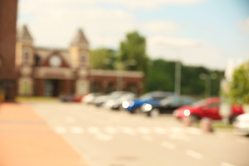 Blurred view of cars in the parking lot