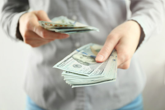 Woman counting money, closeup