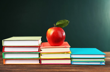 Back to school concept with apple and books