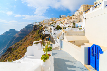 Fototapeta premium Footpath in Firostefani village with typical Greek white architecture, Santorini island, Greece