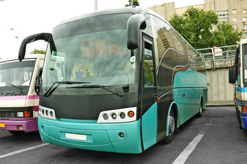 Fototapeta na wymiar New tourist bus at station