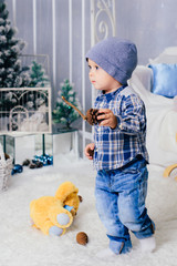 little boy in a New Year's decor, baby and Christmas 1