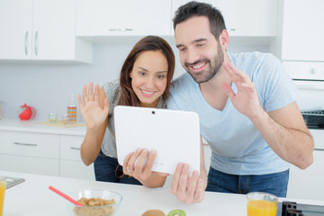 Couple making a video call using a tablet