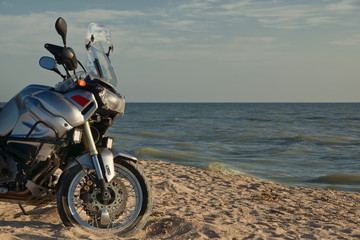 Fototapeta na wymiar Motorcycle on sea beash