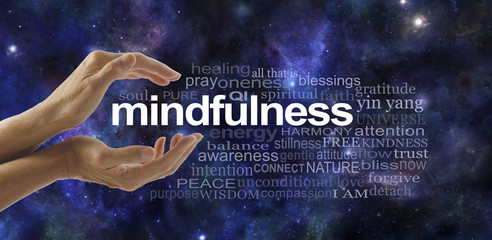Mindfulness Meditation Word Cloud - side view of female cupped hands with the word MINDFULNESS...