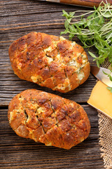 Homemade fresh bread stuffed cheese and garlic with herbs