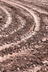 Tractor track marks in the mud