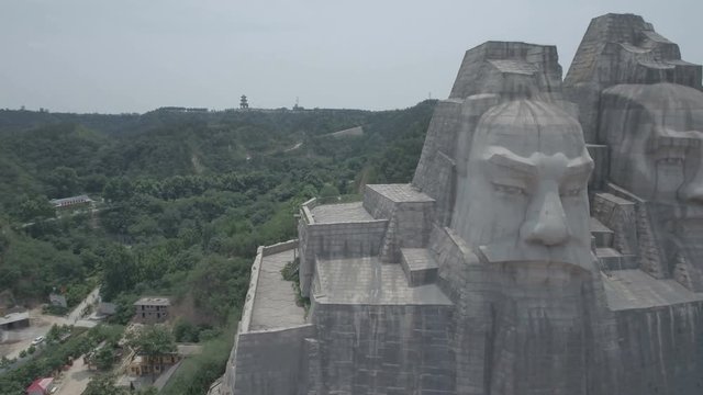 Aerial view of massive abstract statues imperial emperors in China