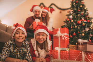 Fototapeta na wymiar Happy Family At Christmas Holiday