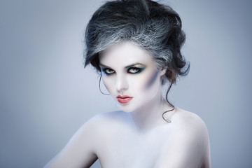 Fototapeta premium Woman with creative makeup and body-art