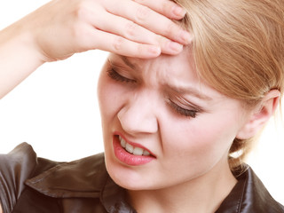 Headache. Woman suffering from head pain isolated.