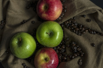 Vintage red and green apple with coffee bean