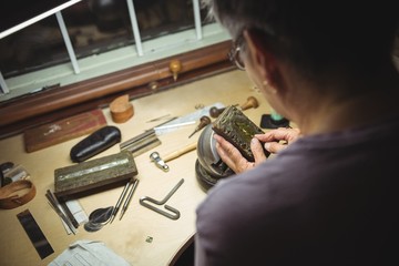 Craftswoman working in workshop