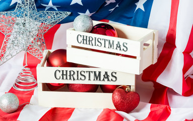 Fototapeta na wymiar USA flag and Merry Xmas with lovely red Heart and Silver Balls