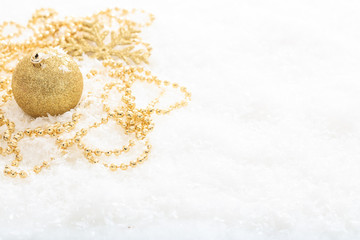 Christmas ball and snow on white background