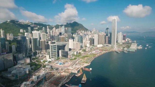 Aerial Drone Flight Towards The Iconic Modern Skyline Of Hong Kong