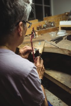 Craftswoman working in workshop