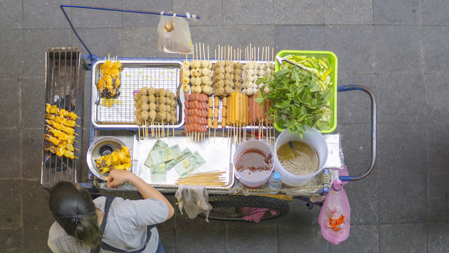 Top View Of A Thai Street Food Vendor Cart Preparing Food