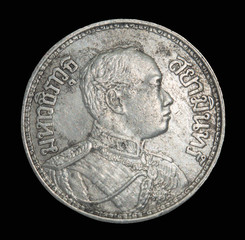 Rama IV coin Vajiravudh front isolated on black background, Thailand
