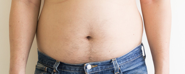 Naklejka premium Fat man with a big belly. Diet