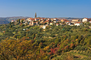 Fototapeta na wymiar Typical old Istrian village Padna on a hill in autumn, Slovenia