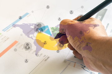 Investment planning and reporting concept. Financial planner hand holding pen over the Investment...