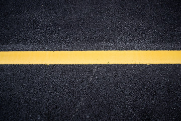 Fototapeta premium Asphalt with yellow road line