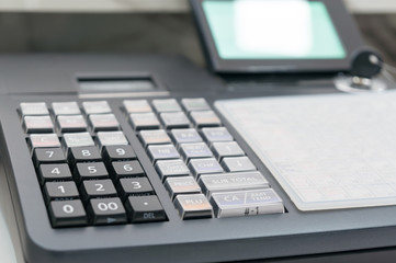 Soft focus Of Cash Register With Printed Receipt