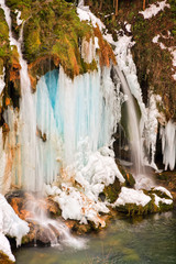 Frozen waterfalls of Croatian national park Plitvice lakes in winter