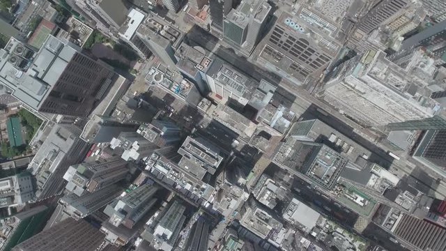 Aerial drone shot flying over residential apartment buildings and commercial property Hong Kong