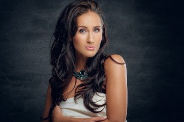 Fototapeta premium Brunette female in white bra.