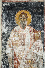 An ancient saint portrait drawing on the wall of Roman Church