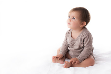 Fototapeta premium Adorable baby girl portrait on white background