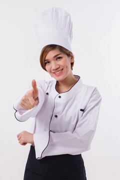 happy, smiling, positive, successful woman chef showing thumb up gesture