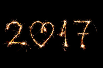 HAPPY NEW YEAR 2017 written with fireworks as a background