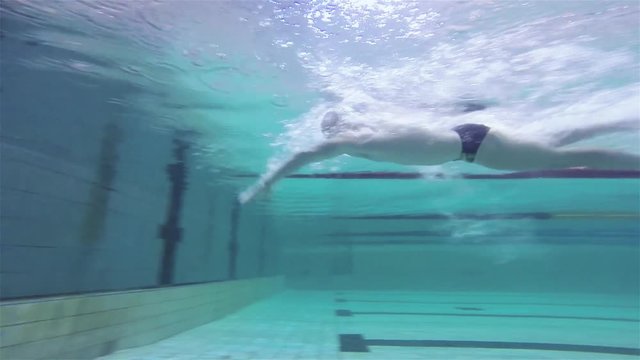 The swimming technique with turning under the water.