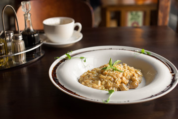 risotto with mushrooms, fresh herbs and parmesan cheese