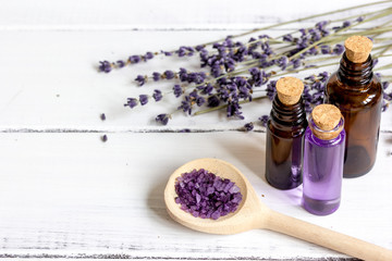 Fototapeta na wymiar organic cosmetics with lavender on wooden background
