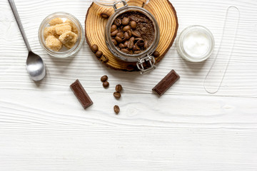 Organic cosmetics based on coffee top view wooden background