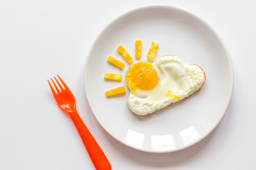 sunshine fried eggs breakfast for kid on white background