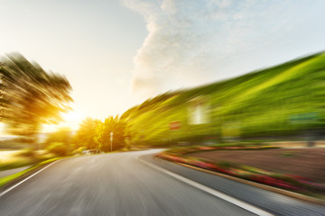 sunrise from hill on view from empty rural road