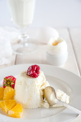 sweet breakfast with ice cream and berries close up