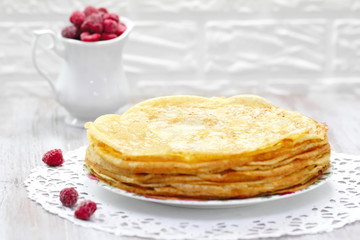 Pancakes with raspberries and butter