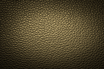 Yellow leather texture or leather background from natural leather sheet for design with copy space for text or image. Closeup detail on leather texture background. Dark edged.