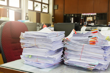 Business Concept, Pile of unfinished business documents on office desk, Stack of business paper